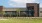 Exterior of a building with a lawn